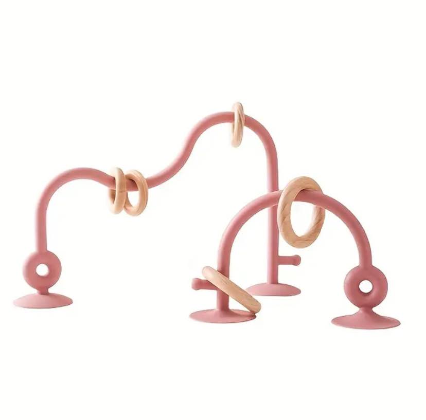 Silicon and Wood Ring Suction Toy
