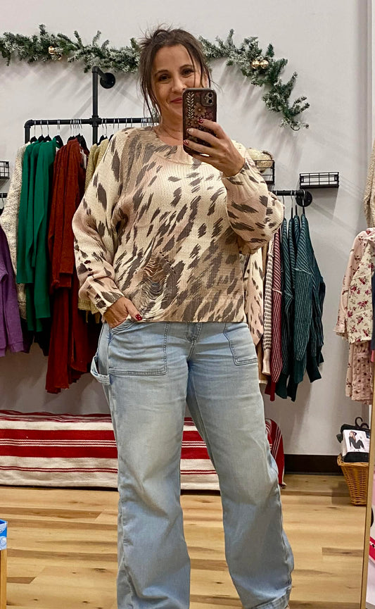 UMGEE Distressed Cream Sweater