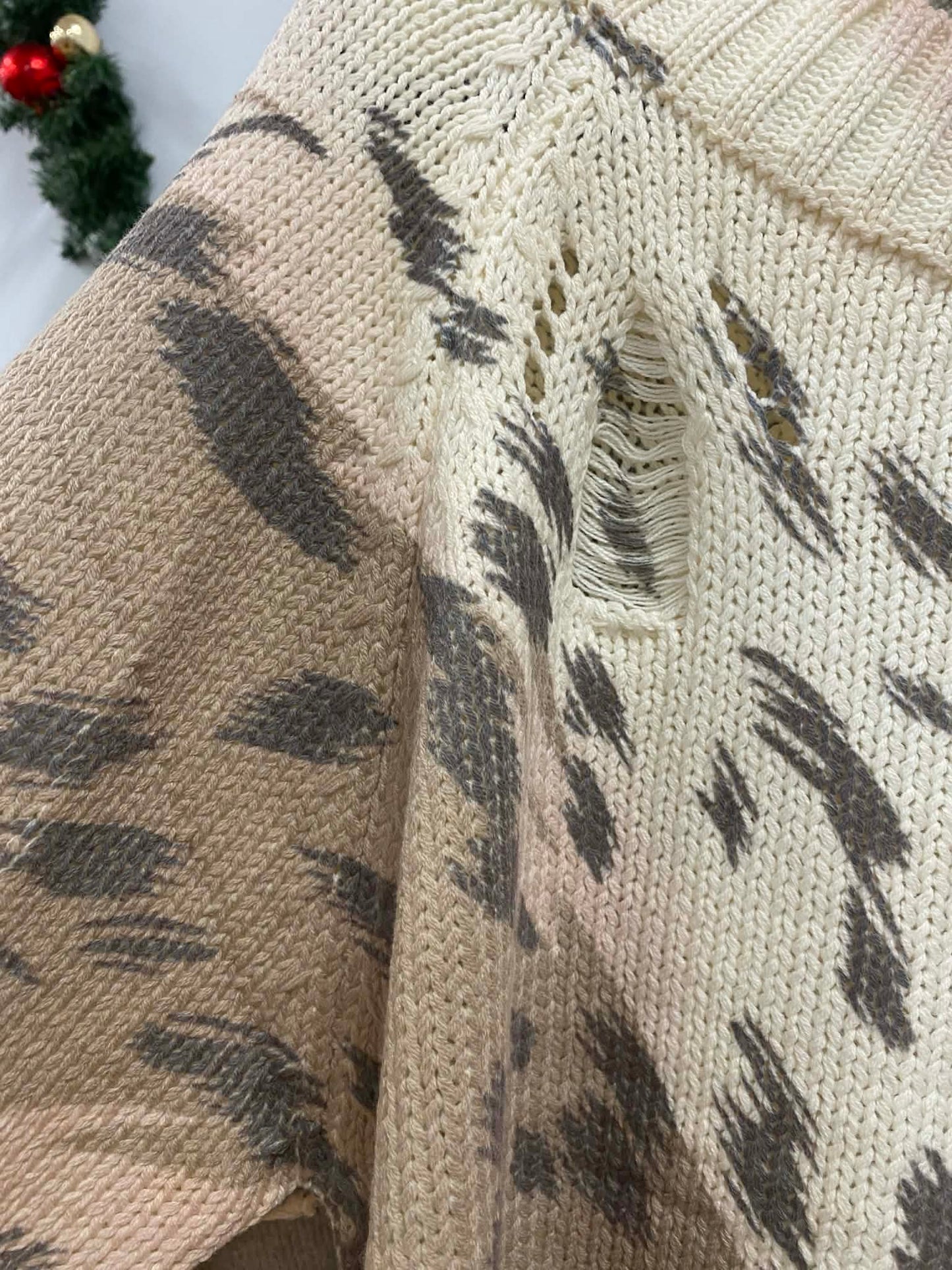 UMGEE Distressed Cream Sweater