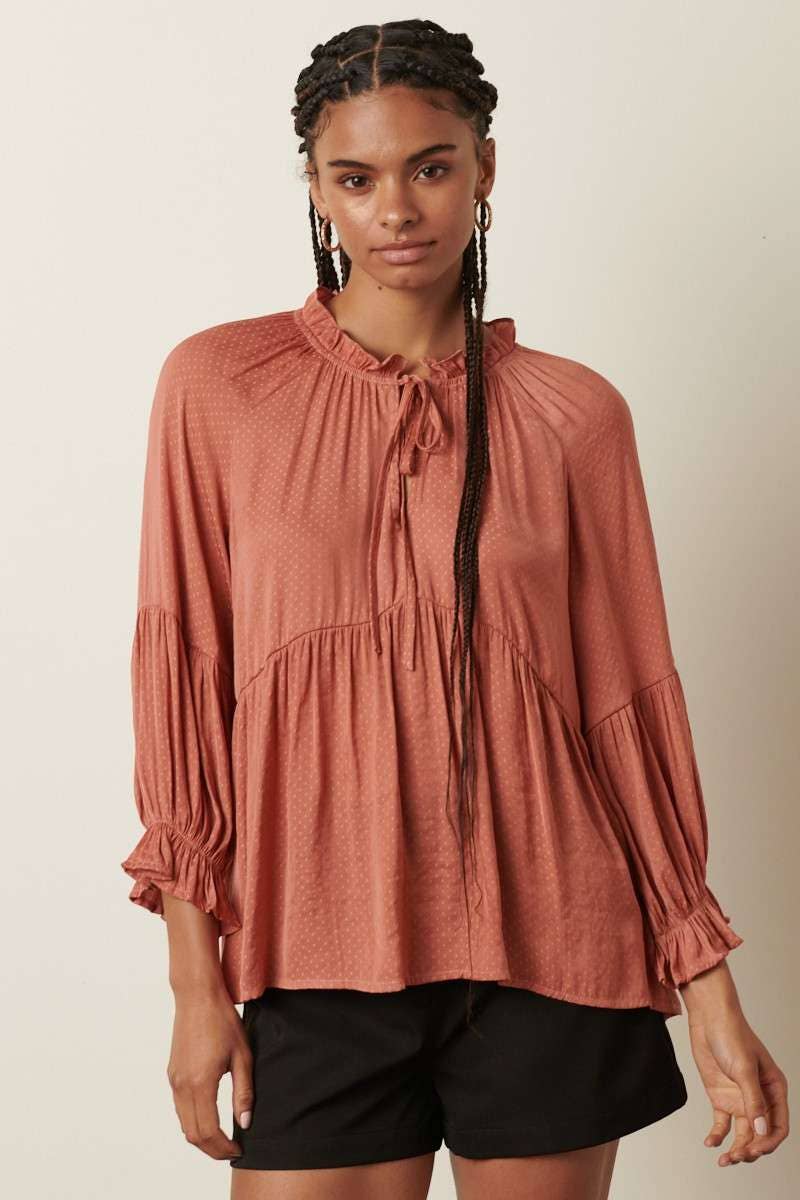 RUFFLE TIE FRONT BABYDOLL BLOUSE